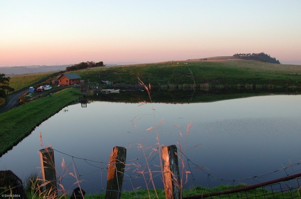 Harelaw Dam
The last rays of the sun just catching the hills around Harelaw Dam [url=http://harelaw.net/index.html]trout fishery.[/url]  The Neilston pad is on the right hand side in the distance. [url=www.multimap.com/map/browse.cgi?lat=55.7528&lon=-4.4363&scale=25000&icon=x/]Map location.[/url]

