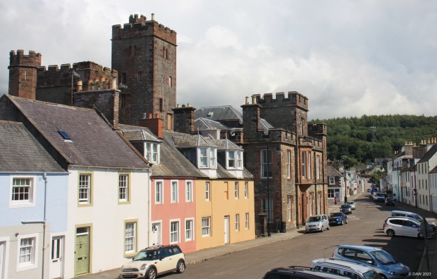 The High Street, Kirkcudbright
A view along High Street in Kirkcudbright.  The impressive building with the tower is the former court house, built in 1868.  The tower is the prison, built in 1815.  The prison colsed in 1883 and the court in 2015. [url=http://streetmap.co.uk/map?X=268101&Y=550898&A=Y&Z=110/] Map location. [/url]
