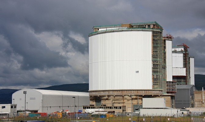 Hunterston A Power Station, 2009
Opened in September 1964 Hunterston was Scotland's first civil Nuclear generating station.  At that time it was also the largest in the world with an output of 360MW.  The final reactor was decomissioned in 1990 and the fuel has since been removed.  The low building on the left is a new bunker for storing low level waste and at the time this photo was taken the glass was being replaced with a rather unpleasant white cladding.  This is how it will remain until  2081 when it will be completely demolished.
