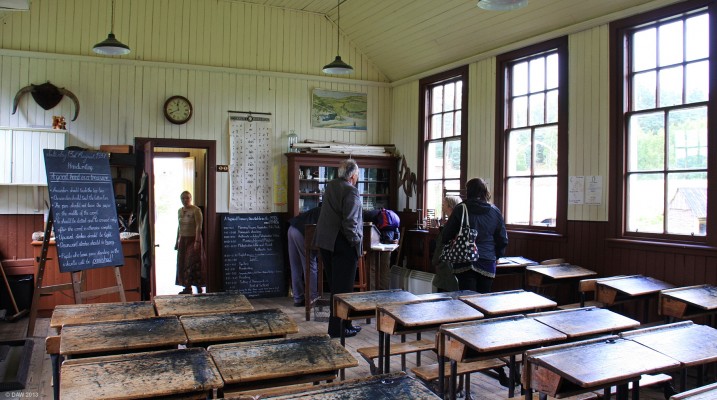 Inside the School House, Highland Folk Museum
The School House consisted of a classroom for around 40 pupils, a teachers' room, cloakroom and toilet.  The school has been recreated here for the period of 1937.  It includes the glass fronted cupboard in the corner donated by Coates Mills of Paisley to many schools at the time.
