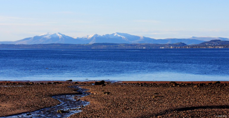 Isle of Arran and Bute
A winter view of Arran and the isle of Bute from Lunderston Bay. The town of Rothesay is on the right hand side. [url=http://streetmap.co.uk/map.srf?X=220349&Y=674637&A=Y&Z=120/] Map location. [/url]
