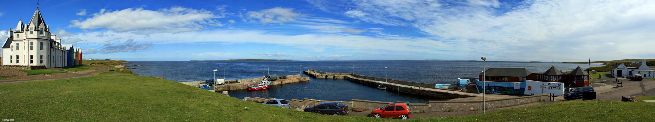First and last on Scottish mainland
ohn O' Groats Harbour, not really the first and last, that honour goes to Dunnet head but you don't have to drive down a single track road to get here.  The building on the left was a hotel and has now been converted into holiday flats.
