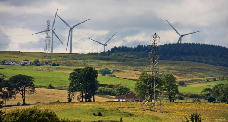 July, Pylons and Wind Turbines
The changing landscape around Neilston, it used to just be Pylons, now its also Wind Turbines, these four belong to the Neilston Wind farm.  [url=http://streetmap.co.uk/map.srf?X=246760&Y=657613&A=Y&Z=120/] Map location. [/url]
