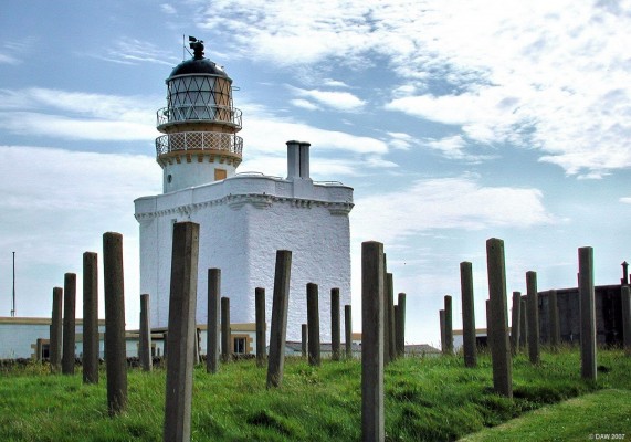 The old Kinnaird Head Lighthouse, Fraserburgh
This 16th century tower house  was modified in 1787 to become Kinnaird Lighthouse.  It remained in use until 1991 when it was replaced by a less impressive structure.  Today it is part of the [url=http://www.lighthousemuseum.org.uk/]Scottish Lighthouse Museum[/url] which has another building nearby with lots of displays of the History of Lighthouses in Scotland.  The concrete posts were apparently used for hanging fishing nets on.
