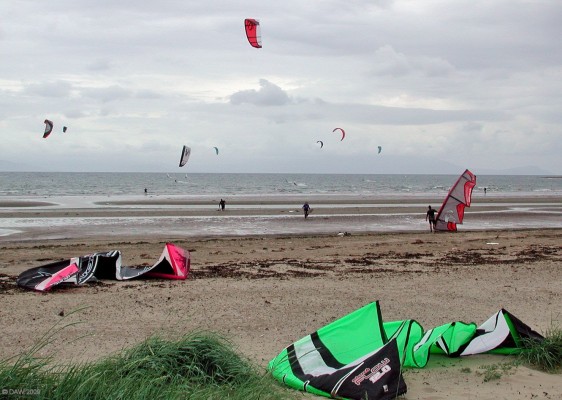 Kite surfers, Troon beach
You can just about make out the island of Arran in the distance.  [url=http://www.streetmap.co.uk/map.srf?X=232620&Y=629927&A=Y&Z=120/] Map location. [/url]
