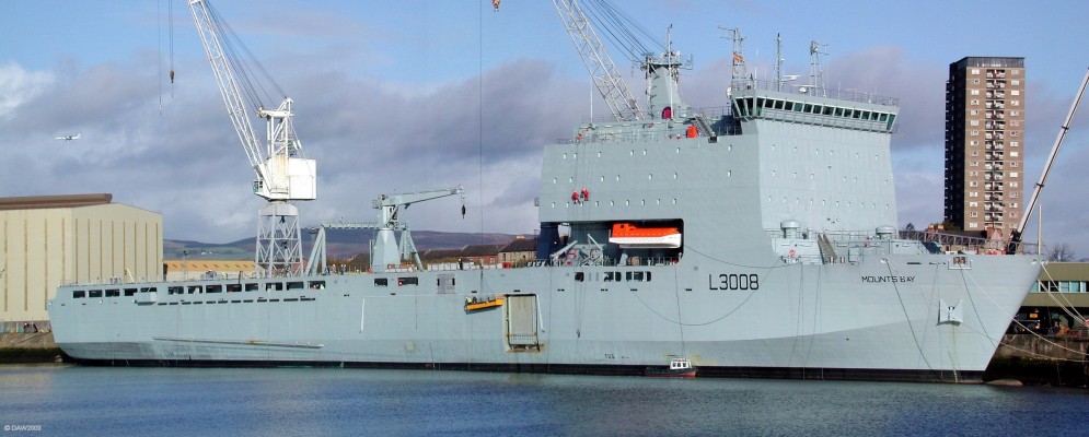 RFA Mounts Bay, BAE Systems, Glasgow
Mounts Bay is one of 4 Bay class Auxiliary Landing Ship Dock LSD(A) that the Royal Navy had built to replace the old 'Sir' class best known for their efforts in the Falklands war.  She displaces some 16,000t and can carry over 350 troops and up to 1200 linear metres of vehicles which equates to 32 main battle tanks or 150 light trucks.  She was launched from Govan ship yard in April 2004 and this photo was taken in November 2005 at BAE systems yard at Scotstoun, further down the Clyde.
