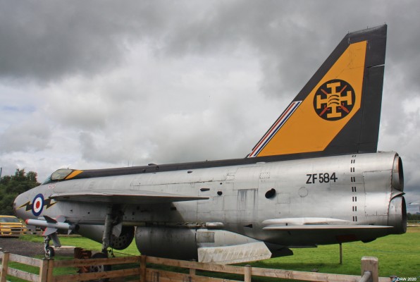 English Electric Lightening, D&G Aviation Museum
A view of the F53 Lightening at Dumfries & Galloway Aviation museum.  This view shows the unusual arrangement of its twin engines, one on top of the other.  The lightening's primary roles was as an interceptor, it had an astonishing climb rate of 20,000ft per minute and was capable of level flight speed of Mach 2.  It was the RAF's first supersonic fighter.  It was designed to meet incoming Soviet bombers at altitudes of up to 60,000ft.  It has been claimed by some pilots to have reached over 80,000ft.
