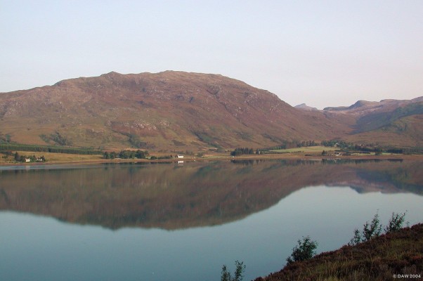 Loch Carron
An early summer morning view of Loch Carron from the south shore.  The white Church at Kirkton can be seen on the far side with Glas Bheinn rising behind to some 729m.  [url=www.multimap.com/map/browse.cgi?lat=57.4002&lon=-5.4547&scale=25000&icon=x/]Map location[/url]
