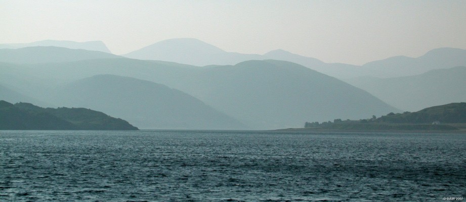 Loch Broom from Ullapool
Looking West along Loch Broom from Ullapool.  The early morning haze makes the distant hills seem to merge together.  [url=http://www.multimap.com/map/browse.cgi?lat=57.8937&lon=-5.1658&scale=25000&icon=x/]Map location[/url]

