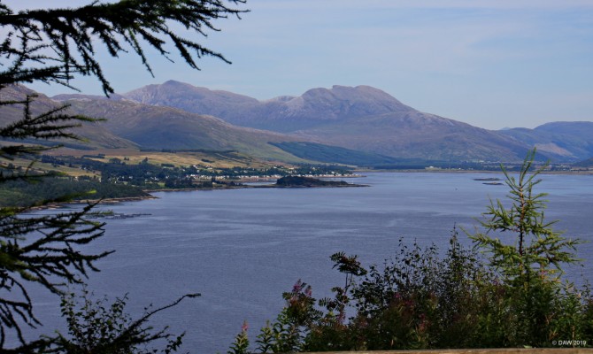Loch Carron from above Strome Ferry
A view looking west along the sea loch of Loch Carron, its deepest point is around 100m.  In 2018 it was designated as a marine protection area due to its colony of flame shells around the Strome Castle area, said to be the largest such colony in the world.  Marine Protection status means any sort of fishing that would damage the seabed is forbidden.  [url=https://streetmap.co.uk/map.srf?X=186755&Y=834392&A=Y&Z=120/] Map location. [/url]
