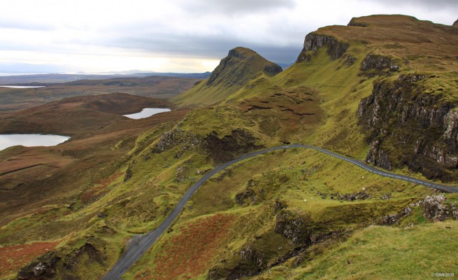 Looking south west over Loch Cleat, Isle of Skye
The twisty road you see is the 'short cut' between Staffin and Uig.  All the best views are down roads like this on Skye.  [url=http://streetmap.co.uk/map.srf?X=144051&Y=868008&A=Y&Z=120/] Map location. [/url]
