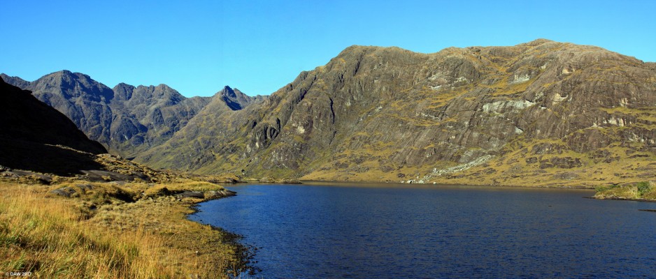 Loch Coruisk, Skye
There are two ways to get here, a very long walk or a boat trip from Elgol, I recommend the latter.  Notice the recent rock fall just right of centre, some of these boulders are the size of a house.  [url=http://streetmap.co.uk/map.srf?X=148749&Y=819821&A=Y&Z=126/] Map location. [/url] 
