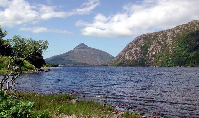 Loch More, Sutherland
Looking west along Loch More.  Ben Stack rises to some 720m in the distance.  Due to the steep hills around the shore the water in places is as deep as 80m (340ft) [url=www.multimap.com/map/browse.cgi?lat=58.2887&lon=-4.8521&scale=25000&icon=x/]Map location[/url]
