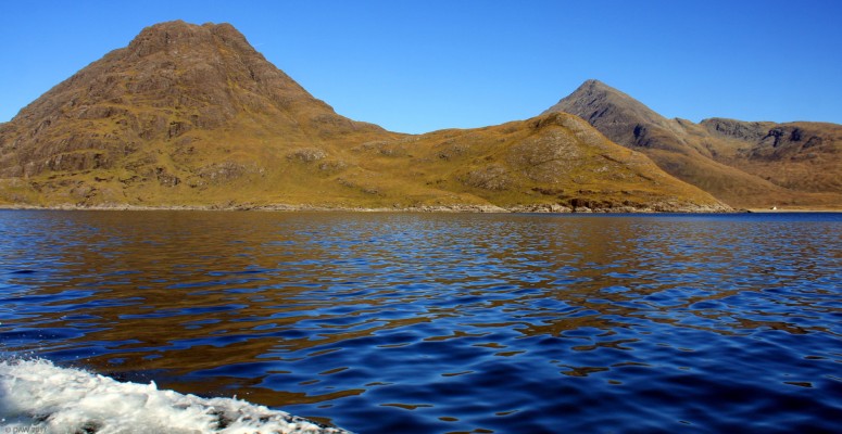 Loch Scavaig, Isle opf Skye
Sgurr na Stri (497m) is on the left and Bla Bheinn (928m) is on the right.  The Camasunary Bothy can be seen in the distance near the shore.  [url=http://streetmap.co.uk/map.srf?X=149379&Y=817579&A=Y&Z=126/] Map location. [/url]
