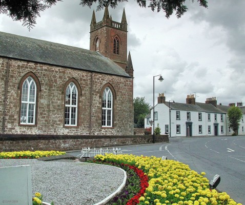 Lochmaben Church, Lochmaben
Lochmabem is an attractive little town west of Lockerbie.  The church was completed in 1820, the spectacular flower bed surrounds the war memorial just out of frame on the left.   [url=http://www.streetmap.co.uk/map.srf?X=308398&Y=582285&A=Y&Z=115/] Map location. [/url]
