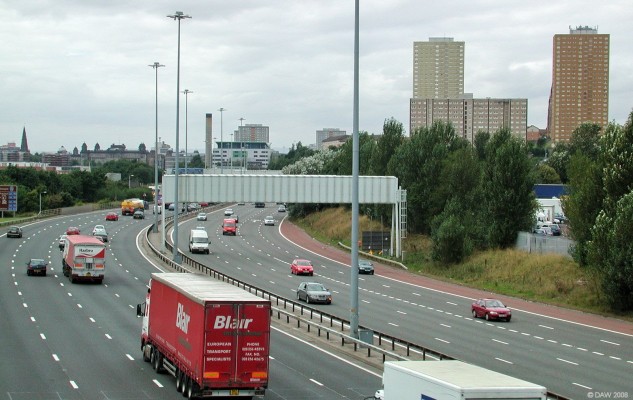M8 Motorway
A view looking west along the M8 as it winds its way round the north side of the city centre.  The chimmney is on the Royal Infirmary and the steeple to the left is that of Glasgow Cathedral.  [url=http://www.streetmap.co.uk/idmap.srf?X=261805&Y=666025&A=Y&Z=120/]Map location.[/url]
