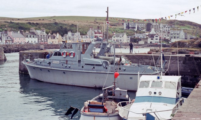 MV Aquila Maris, Portpatrick, 1989
Aquila Maris was the range safety boat at the West Freugh firing range when it was operated by the MoD at the time this photo was taken.  It was based here at the harbour in Portpatrick although the range was in Luce Bay.
