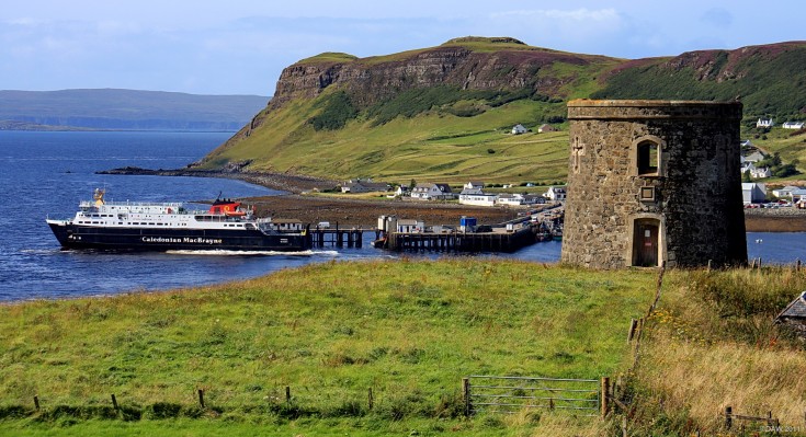 M.V. Hebrides at Uig, Skye
Hebrides using her thruster to reverse in to the link span at Uig Harbour.  Launched in 2000 at Ferguson's Shipyard in Port Glasgow she can carry 612 passengers and up 100 cars.  The Tower on the right was built by Captain Fraser, a notorious landlord during the Clearances. [url=http://www.streetmap.co.uk/map.srf?X=139656&Y=863260&A=Y&Z=115/] Map location. [/url]
