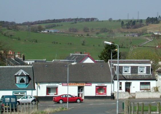 The Main Store, Main Street, Neilston
Over looking Mainstore from Doublehedges road with the Fereneze hills in the background. [url=http://www.streetmap.co.uk/streetmap.dll?G2M?X=247618&Y=656942&A=Y&Z=1/]Map location[/url]
