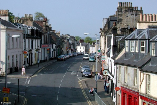 Main Street, Beith
A view along the main street at Beith.  One of Beith's claims to fame is that it was the birth place of Dr Henry Faulds in 1843.  He is recognised as the person to come up with the idea of using finger prints in criminal investigations.  He published this idea in 'Nature' journal in 1880.
