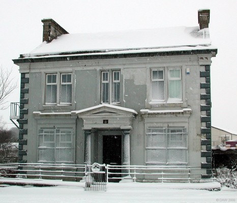 The Masonic Lodge, Neilston
Lodge [url=http://www.thistleandcrown.org//] Thistle & Crown [/url], No 1167.   I think someone must have pinched their ladder half way through painting the front of the building.  Taken in March 2006 during some inclement weather.
