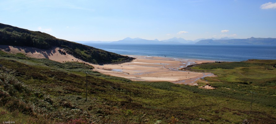 Meallabahn beach near Applecross
Overlooking the beautiful beach at Meallabhan on the Applecross peninsula.  Its even warm enough for there to be some brave souls in the water.  The island of Skye can be seen in the distance.[url=https://streetmap.co.uk/map.srf?X=168517&Y=849098&A=Y&Z=115/] Map location. [/url]
