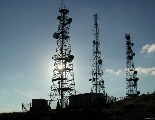 Microwave Relay Masts, Brown Carrick Hills, Ayrshire
Formally used by the Royal Navy and US Navy when they were based in the Holy Loch but now in commercial use.  At the time this photo was taken in 2003 the buildings below the mast on the right were still marked as MOD property. [url=http://www.streetmap.co.uk/map.srf?X=229322&Y=616250&A=Y&Z=120/] Map location. [/url]
