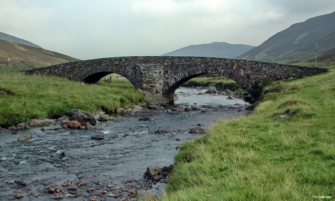 Military Road, Glen Clunie
In an attempt to supress a Jacobite rising in the 18th century a series of Military roads were constructed throughout Scotland.  General Wade gets credit for most of them but General Caulfield was actualy responsible for the greatest amount of construction, some 800 miles in total.  This is one of his roads which leaves the path of the present day A93 at this bridge. [url=www.multimap.com/map/browse.cgi?lat=56.9617&lon=-3.4027&scale=25000&icon=x/]Map location[/url]
