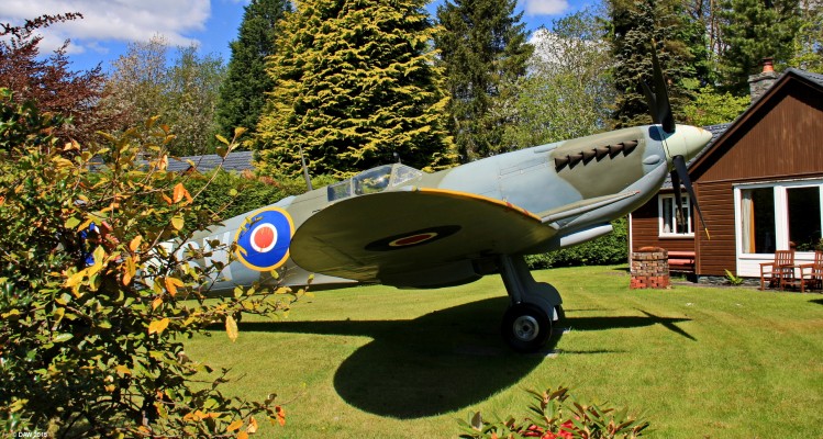 The Moffat Spitfire
This full size replica Spitfire sits in the private garden of a house in a quiet cul-de-sac of the town of Moffat.  It was put there by a retired Doctor with the long term plan to leave it to the town of Moffat.  Air Chief Marshal Hugh Dowding was born in the town and he was credited with masterminding the Battle of Britain in which the Spitfire played a vital role.
