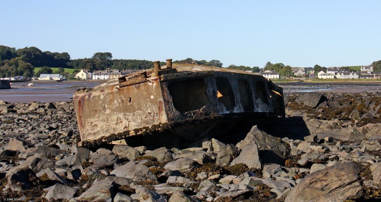 Mulberry Harbour Beetle, Garlieston Bay
One of the two 'Beetles' that remain on the rocks at Garlieston after breaking free from a tug more than 70 years ago during a storm.  They were constructed from re-enforced concrete due to the lack of availability of the quantity of steel that would have otherwise been required.  The concrete wall thickness is only about 1 inch on the sides and has suffered great damage over the years.
