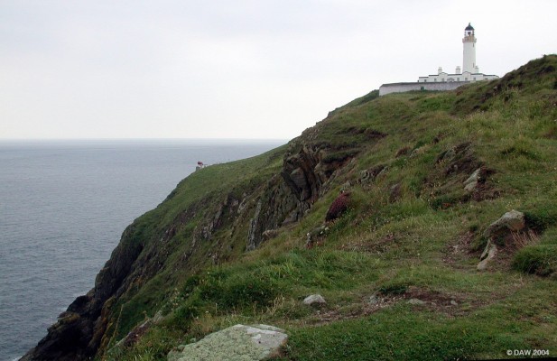 The Mull of Galloway Lighthouse, South West Scotland
If you keep driving down the Rhins of Galloway you eventually run out of road.  At that point you can't go any further south in Scotland, you are at the same latitude as Durham in Northern England.  The lighthouse was built in 1828 and stands on cliffs some 260ft high, the foghorn can be seen lower down.  In 1988 the lighthouse was automated and the outbuildings are now privately owned.
