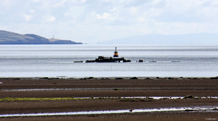 Mullbery "Hippo" remains, Rigg Bay, Garlieston
This is what remains in Rigg Bay of an experimental Mullbery harbour component called "Hippo"  It was a concrete caisson with a steel superstructure above.  This type wasn't in the final design but stood intact in the bay from around 1943 until destroyed by a storm in 2006.  [url=http://streetmap.co.uk/map.srf?X=247658&Y=544807&A=Y&Z=115/] Map location. [/url]
