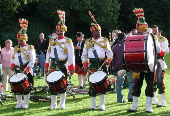2006, Drummers
Drummers in the Patiala Pipe Band from Pakistan enjoy the evening sun at Pig Square during the Neilston Live! event.
