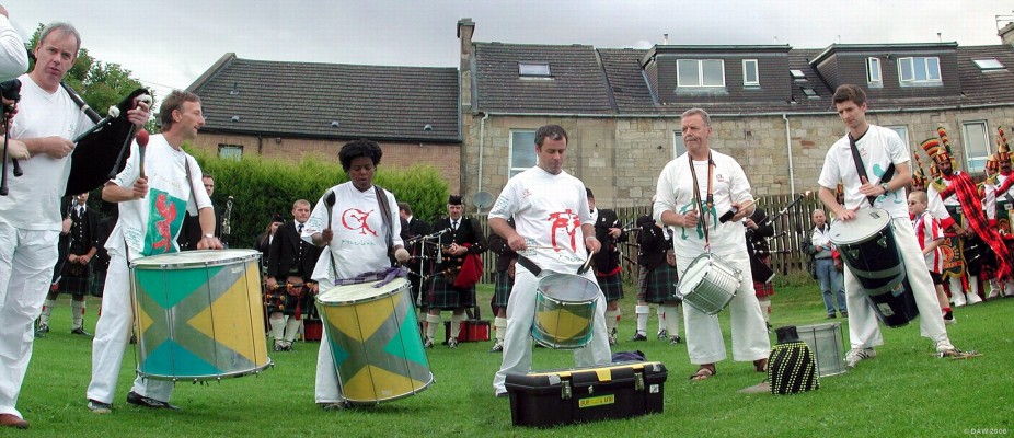 Macumba at Neilston Live! 2006
The Neilston Pipe band and the Patiala pipe band look on as Macumba take centre stage at Pig Square during Neilston Live! 2006.
