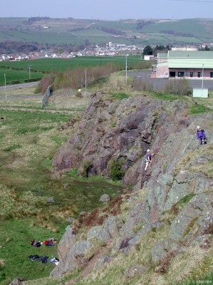 Neilston Quarry, Craig of Neilston
This dis-used quarry above Neilston is marked on the 1863 map so is presumably much older.  Today it is popular for rock climbers to pratice on.  The building behind is the Neilston water treatment plant.  [url=http://www.streetmap.co.uk/streetmap.dll?G2M?X=247485&Y=655780&A=Y&Z=3/]Map location[/url]
