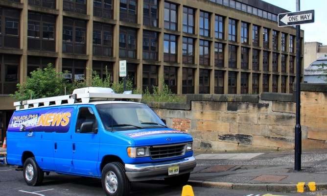 News van, World War Z, Glasgow
Don't believe anything they report, they haven't even noticed they're facing the wrong way on a one way street.
