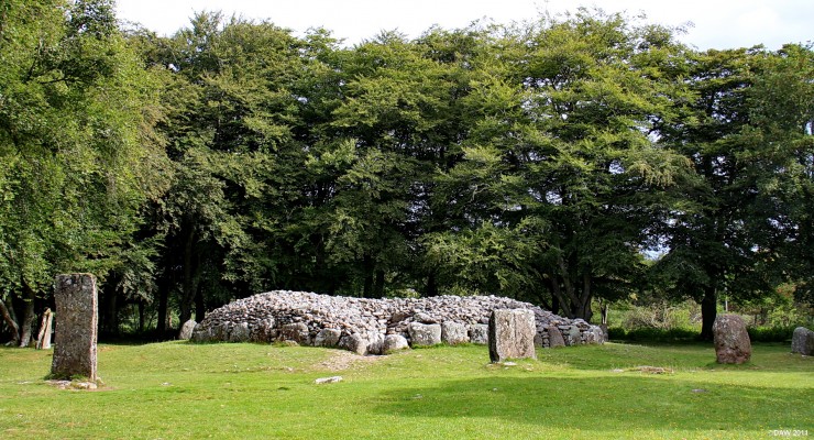 The entrance to the North East Passage Grave, Clava
A view facing the entrance of the North East Passage Grave at Clava.  The entrance passage would have been very low requiring people to crawl in.  The rear wall facing the entrance would have had  Quartz stones that would have been illuminated by the mid winter sun due to the alignment of the entrance passage.  [url=http://www.streetmap.co.uk/map.srf?X=275729&Y=844452&A=Y&Z=115/] map location. [/url]
