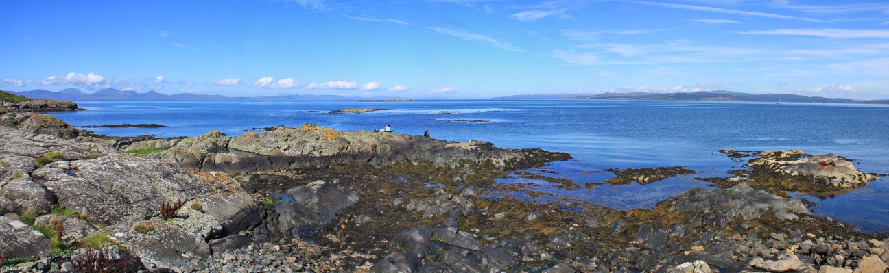North west Gigha Panorama
Looking North west from Port Mor in the Island of Gigha.  In the centre is the small island of Na Duhb-sgeireagan.  On the right is the Knapdale area of the main land and on the left is the Island of Jura with the Paps of Jura on the extreme left.  [url=http://streetmap.co.uk/map.srf?X=166441&Y=654483&A=Y&Z=126/] Map location. [/url]
