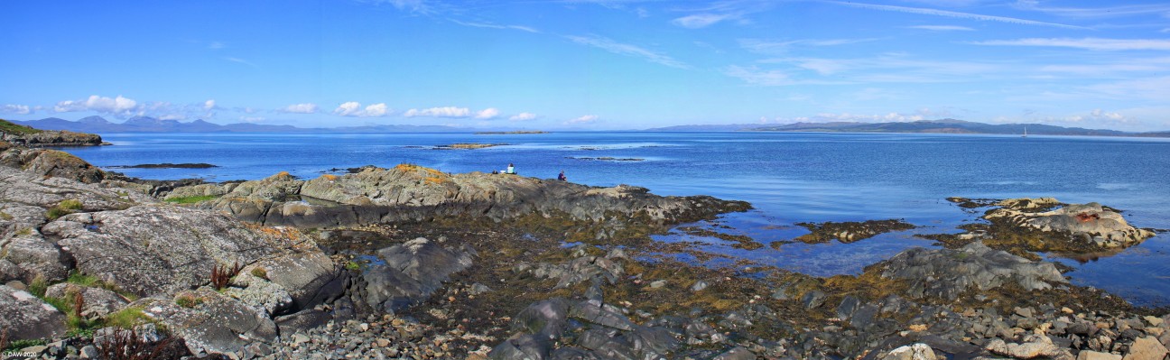 North west Gigha Panorama
Looking North west from Port Mor in the Island of Gigha.  In the centre is the small island of Na Duhb-sgeireagan.  On the right is the Knapdale area of the main land and on the left is the Island of Jura with the Paps of Jura on the extreme left.  [url=http://streetmap.co.uk/map.srf?X=166441&Y=654483&A=Y&Z=126/] Map location. [/url]
