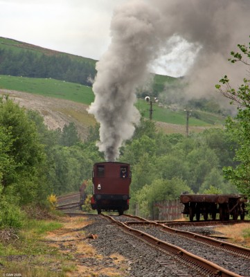 NCB No 10 reversing uphill, Doon Valley Railway
NCB No 10 and a brake van reversing up the hill at the Doon Valley Railway at Dunaskin,
