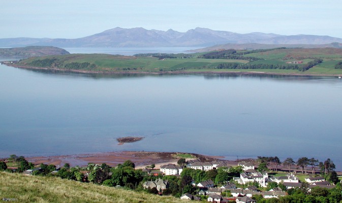 Over looking Largs towards Arran
The mountains of Arran in the distance with the Great Cumbrae in the foreground.  [url=http://www.streetmap.co.uk/map.srf?X=221443&Y=658511&A=Y&Z=120/] Map location. [/url]
