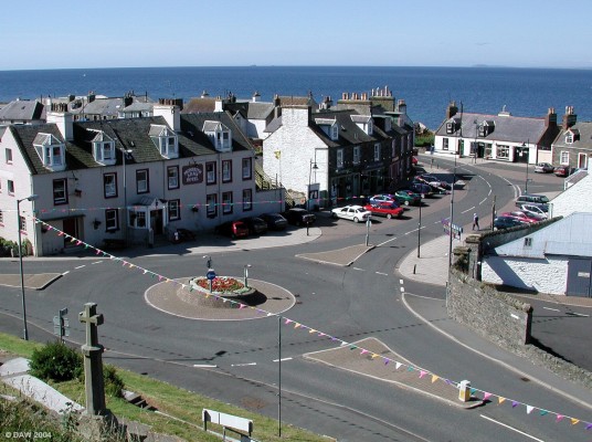 Looking out to Luce Bay from Port William
On the right hand side of the horizon the southern tip of the Mull of Galloway can be see.  The small island near the centre is called Scares.  Luce Bay is used by the RAF as a live firing range although the West Freugh base is now being run down.  Much controversy was caused when it was found depleted uranium munitions have been used in recent years.
