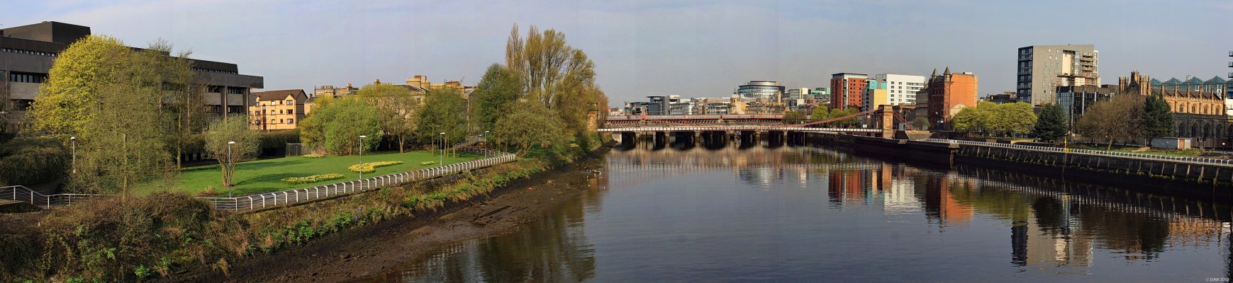 Looking down river from the Albert Bridge, Glasgow
On the left is Sheriff Court, the South Portland Street Suspension bridge can be seen crossing in the centre and on the extreme right is St Andrews Cathedral.  [url=http://www.streetmap.co.uk/map.srf?X=259400&Y=664440&A=Y&Z=115/] Map location. [/url]
