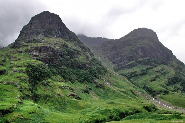 Two of the three sisters, Glen Coe
You can never be sure what Glen Coe will be like until you get there, its never the same on any two days, or even from one hour to the next.  This picture was taken in August and is not untypical.  Aonach Dubh (892m) is on the right and Gearr Aonach (672m) is on the left.  [url=http://www.multimap.com/map/browse.cgi?lat=56.6667&lon=-4.987&scale=25000&icon=x/]Map location[/url]

