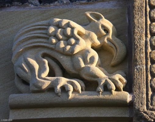 Pencil monument carvings, Largs
There are two similar carvings just below the door, this photo was taken in 2016 when it looked like they had been replaced.   The monument was built in 1912 to commemorate the Battle of Largs in 1263 between the Scots and Norwegians.  It was more of a skirmish than a battle with only a small part of the large Norwegian force being engaged but it was enough to force the Norwegian fleet to leave the Clyde.
