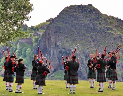 Pipers Piping, Levengrove Park, Dumbarton
This group of Pipers are warming up for the 2008 Scottish Pipe Band Championsship held at Levengrove Park, Dumbarton.  Dumbarton Rock and Castle is in the background.  [url=http://www.streetmap.co.uk/streetmap.dll?G2M?X=239555&Y=674765&A=Y&Z=3/]Map location. [/url]
