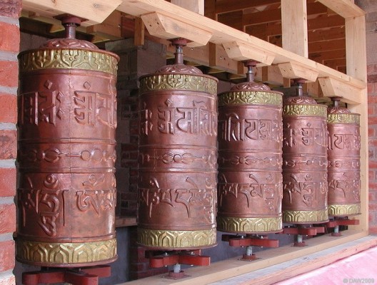 Prayer Wheels at the Samye Ling Tibetan Monastery, Eskdalemuir
The prayer wheels contain millions of mantras (short prayers) for peace and compassion which have been inscribed on paper soaked in saffron water and blessed in a special way.  As  the  wheel is turned clockwise it activates the blessing of the mantras, tramsmitting the energy of peace and compassion in all directions.

