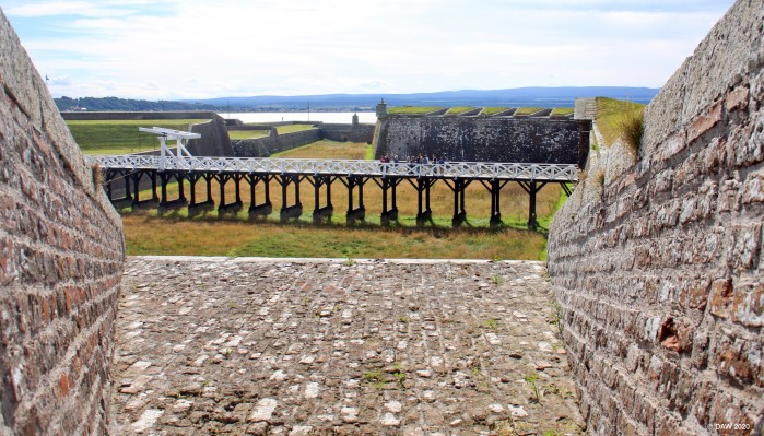 The principal bridge and ditch, Fort George
A view from the parapets of Fort George over the principal Bridge, anyone who got as far as the bridge was open to canon and musket fire from above.  No one ever attempted an assault on the Fort, by the time it was finished in 1769 any prospect of further Jacobite uprisings had receded  [url=https://streetmap.co.uk/map.srf?X=276416&Y=856868&A=Y&Z=115/] Map location. [/url]
