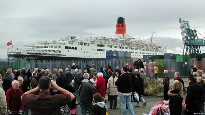 QE2, Greenock Ocean Terminal, 2007
Crowds of people turn out to see the QE2 on her 40th birthday visit to Greenock.  [url=http://www.streetmap.co.uk/map.srf?X=227060&Y=677495&A=Y&Z=120/] Map location. [/url]
