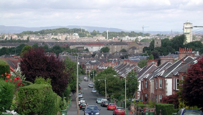 Looking towards Queens park from southside
Queens parks is the tree covered hill in the distance, the Victoria infirmary is immediately in front of it.
